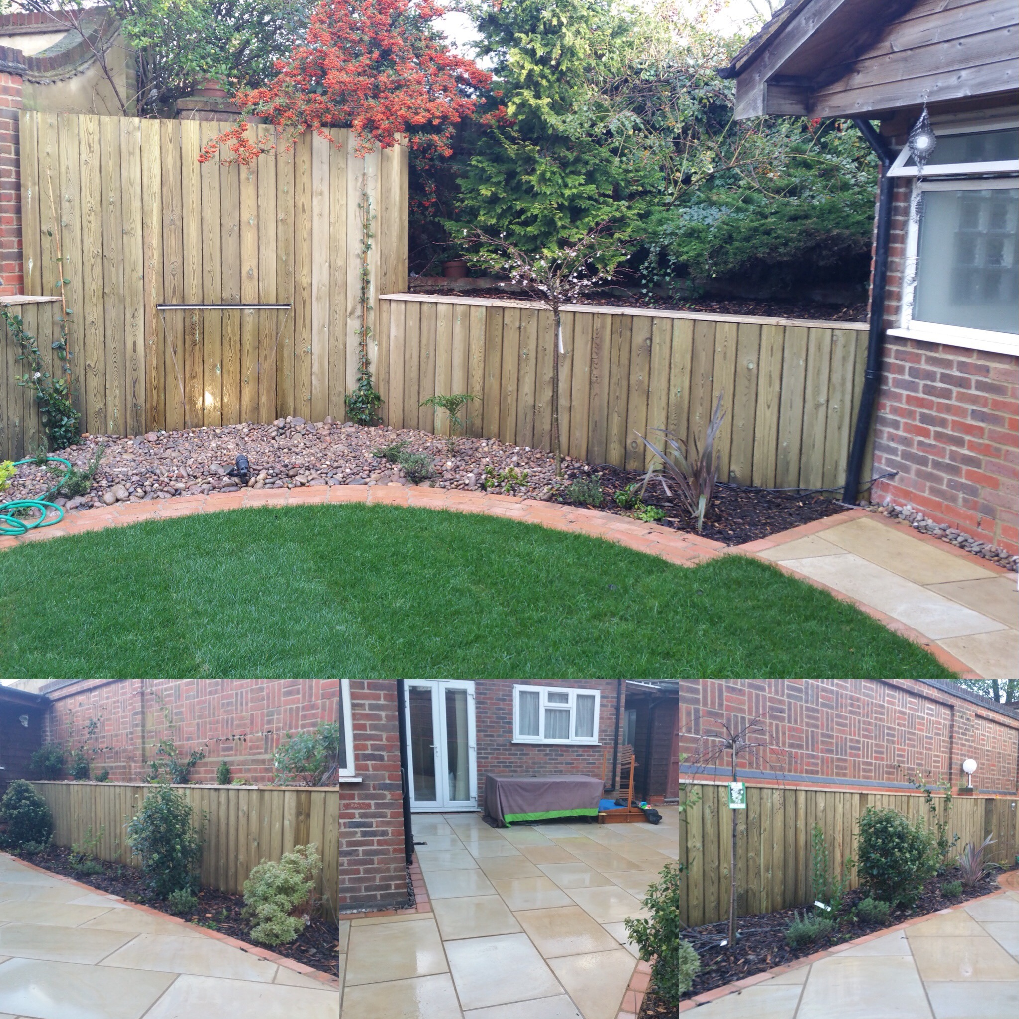 Vertical timber fencing at different heights beside garden planting and paving.